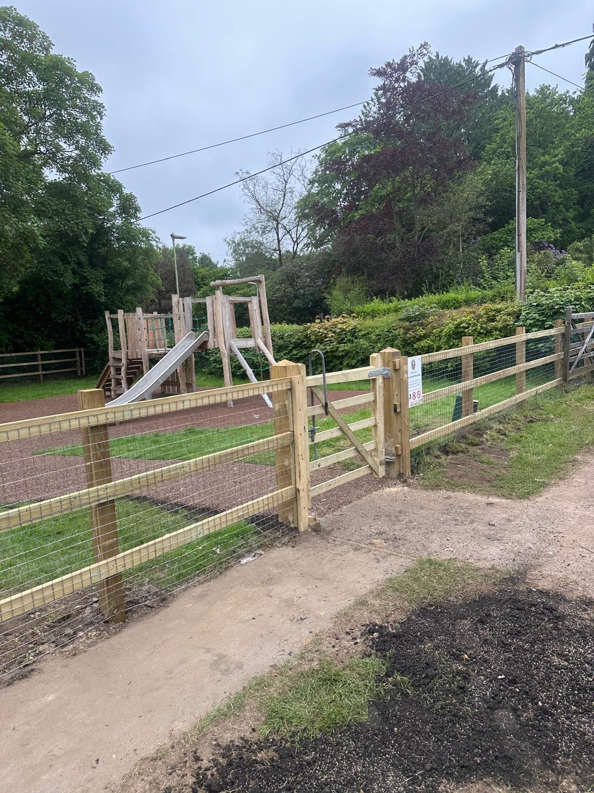 Equestrian paddock post-and-rail fencing