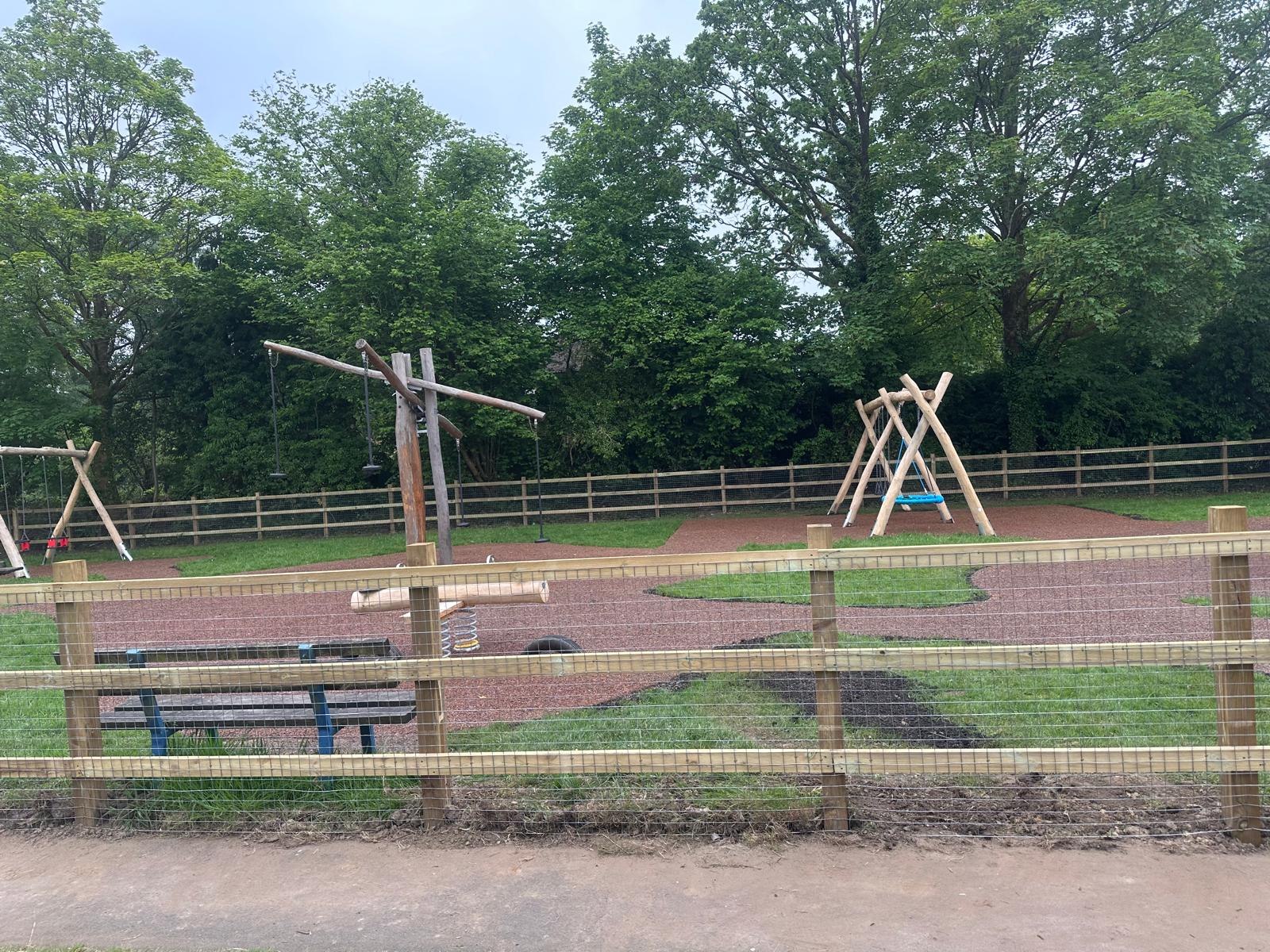Equestrian post-and-rail fencing and gate